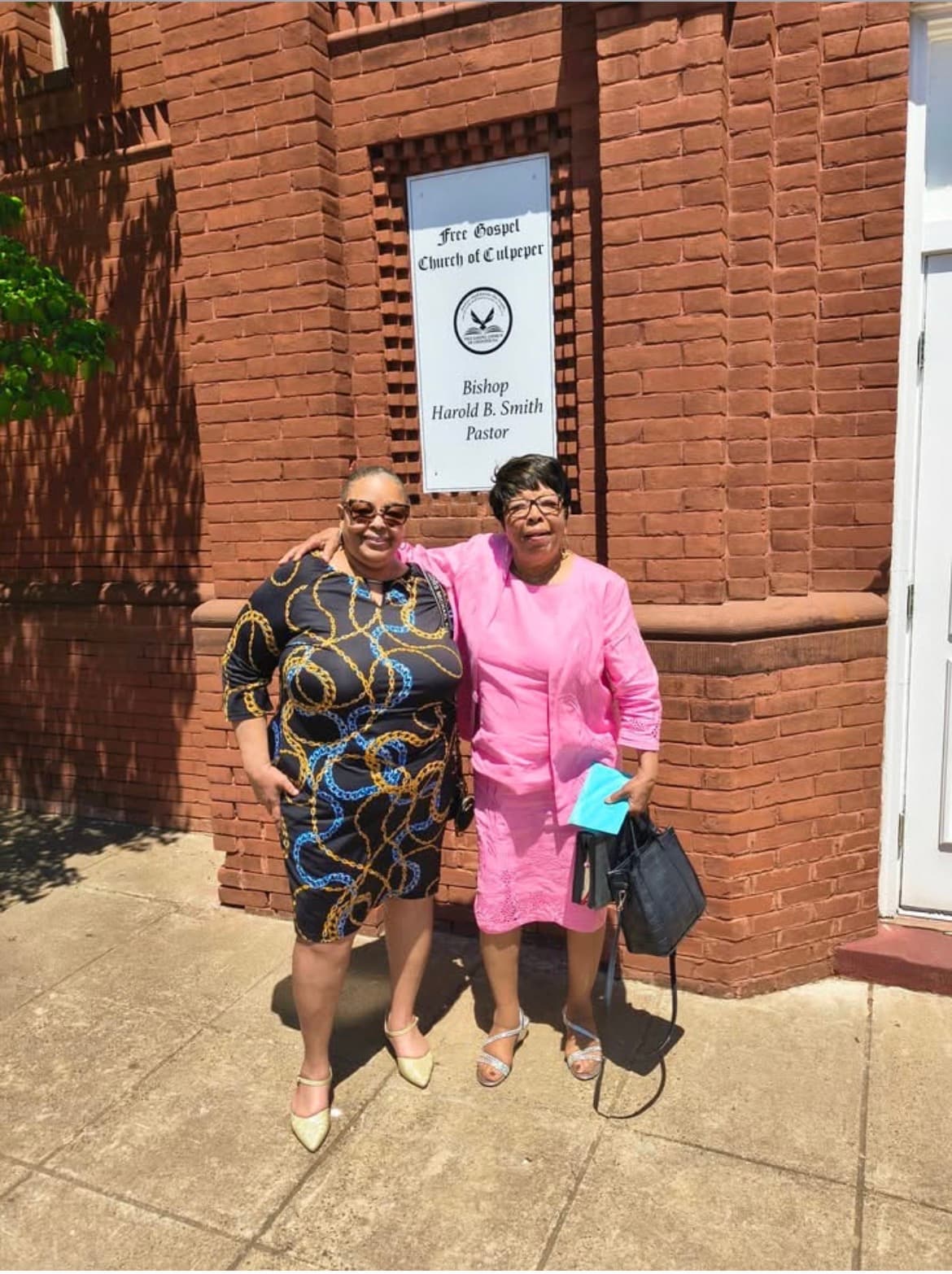 Two mothers outside the Free Gospel Church of Culpeper